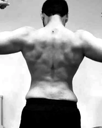 Client, back view, after 31 weeks of coaching