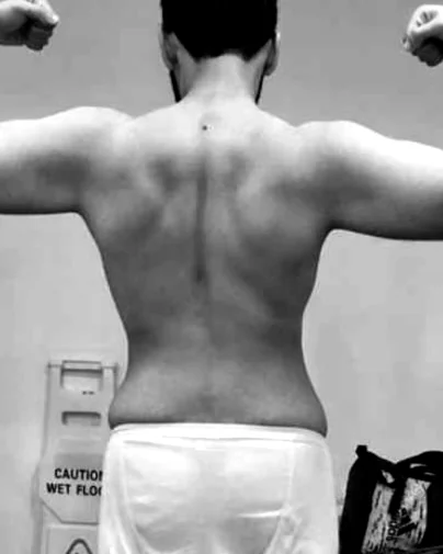 Client, back view, before coaching